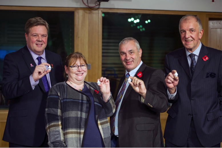 James Lochrie, COO Common Thread Group; Clare Adamson MSP; Brian Topping, Osprey Housing; and Dave Atkinson, Bluerad.